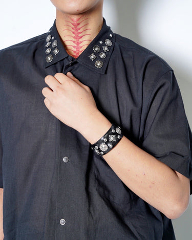 【TOGA ARCHIVES】<br>Leather roll bangle