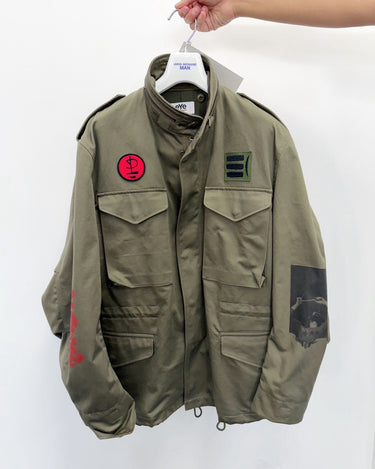 27SS予約受付中<br>【JUNYA WATANABE MAN】<br>"Pink Floyd" MULTI PATCH FIELD JACKET