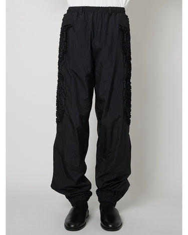 27SS予約受付中<br>【TAAKK】<br>SCULPTURAL Embroidered Windbreaker Pants