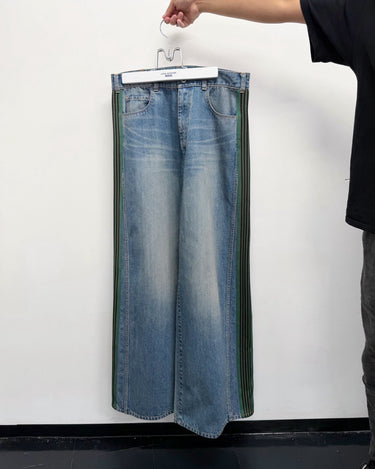 27SS予約受付中<br>【JUNYA WATANABE MAN】<br>× Needles SIDE LINE DENIM PANTS